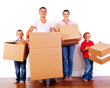 Moving team organising items for transport in North London