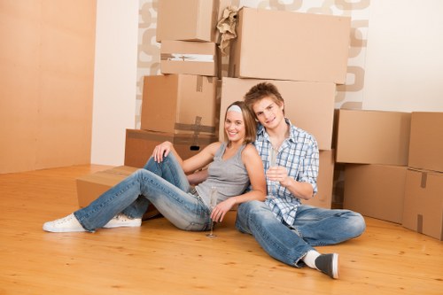 Removal team planning a house move in Tufnell Park with boxes and furniture