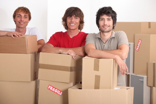 Careful removal of bulky household furniture from a local property