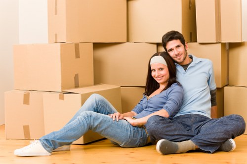 Professional movers loading items for a flat move in Tufnell Park
