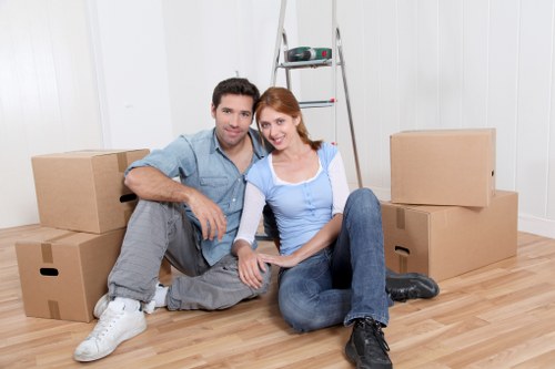 Removal team handling furniture for a Tufnell Park relocation