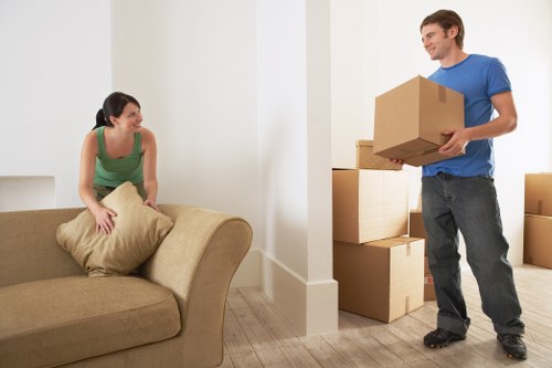 Unpacking boxes in a Tufnell Park flat after moving day
